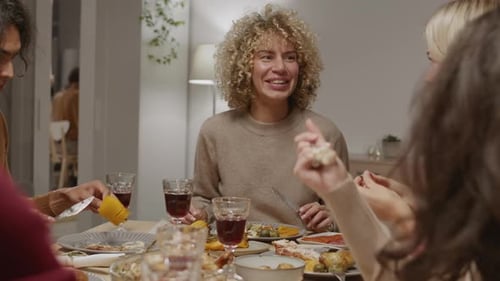 Friends Enjoying a Meal Together Indoors