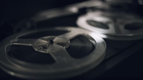 Reels Turning on Old Tape Recording Player