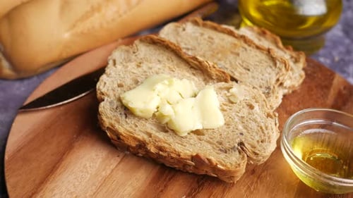 Sliced Bread with Butter and Olive Oil