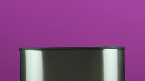 Toast Pops Out of Toaster on Purple Background