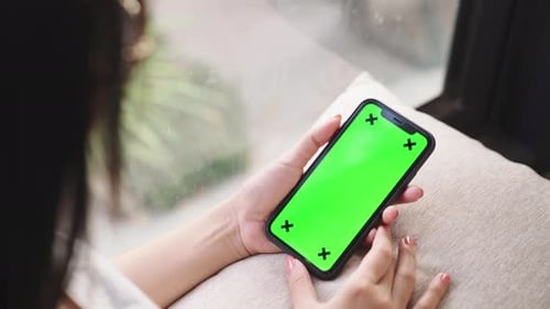 op view chroma key smartphone technology, cell phone holding by hand concept.