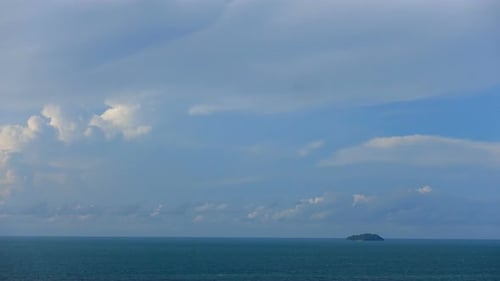 Beautiful tropical beach sea ocean with blue sky and white cloud