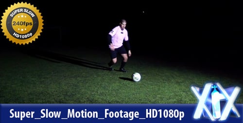Man Juggling Soccer Ball at Night