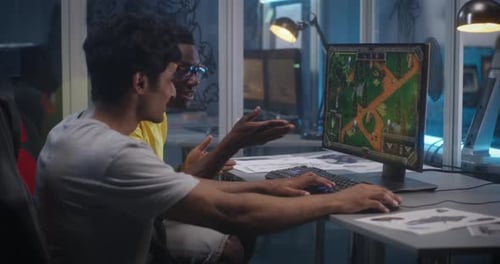 Young Adults Play Video Game Together