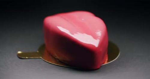 Glossy Red Heart-Shaped Mousse Cake Rotating