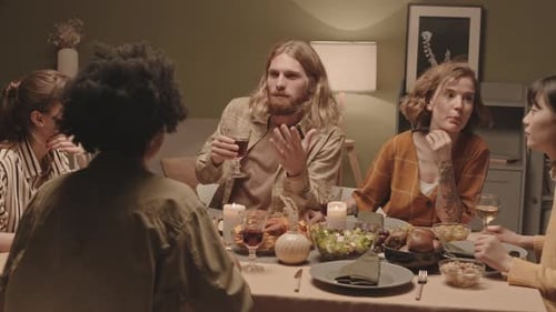 Friends Having Holiday Celebration at Table