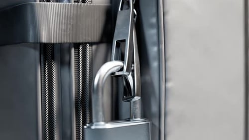 Smart luggage lock. Unlocking with a fingerprint. Padlock with biometrics sensor