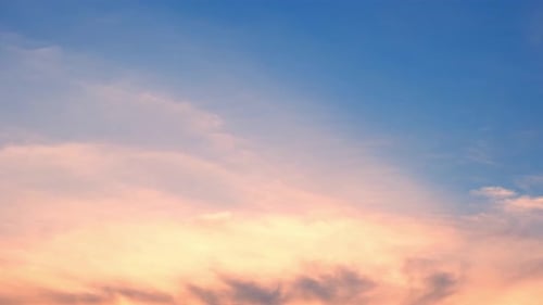 Colorful Sky with Drifting Clouds at Sunrise