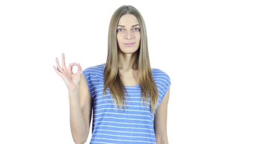 Woman Shows OK Gesture on White Background
