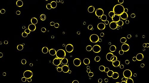 Oil orange drops moving in water