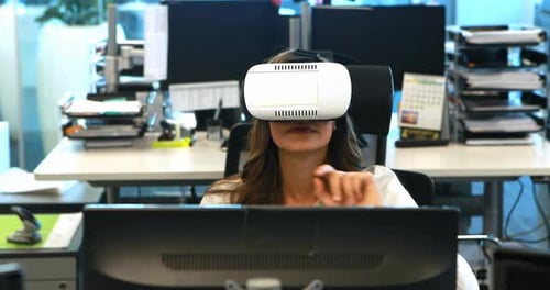 Woman Using VR Headset in a Modern Office