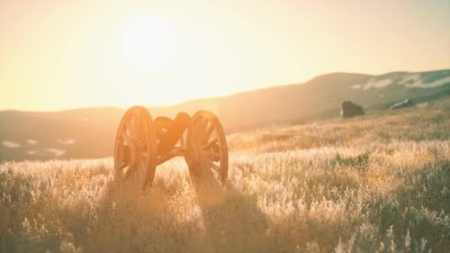 Historic War Gun on the Hill at Sunset