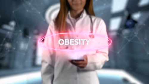 Futuristic Holographic Text Display 'Obesity' in Medical Setting