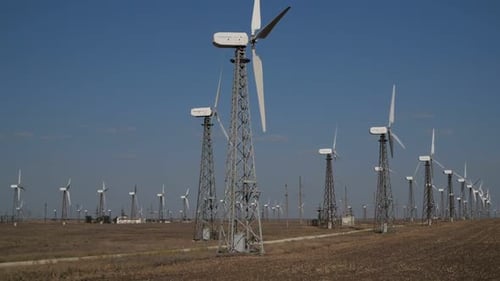 Wind Turbines Spinning in a Rural Environment