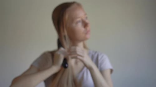 Young Woman Suffers From Hair Loss. Hair Loss Concept