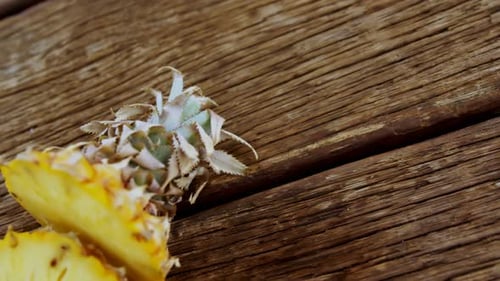 Sliced Pineapple on Wooden Surface