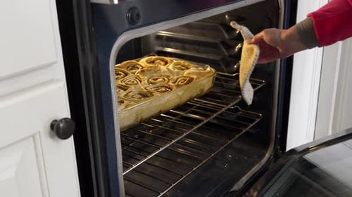 Freshly Baked Cinnamon Rolls Removed from Oven