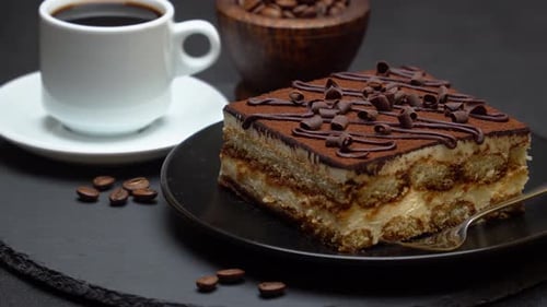 Tiramisu Cake and Coffee on Black Background