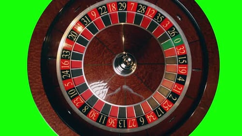 Close Up of Roulette Wheel in Motion at a Green Screen Background