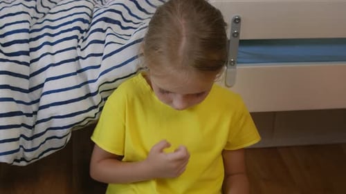 Child Using Laptop Computer at Home