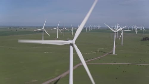 Wind Turbines Generating Clean Energy on Green Field