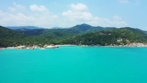 Aerial view scenery of beautiful island beach journey by turquoise lagoon with white sandy backgroun
