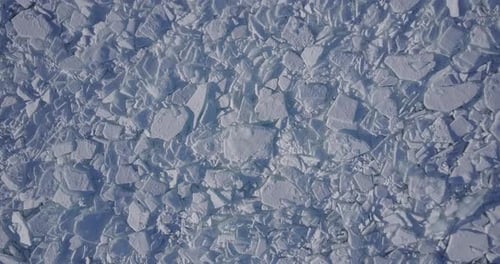 Blocks of Ice Covered With Snow