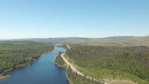 Scenic Panoramic Lake View of Curvy Road in Canadian Nature