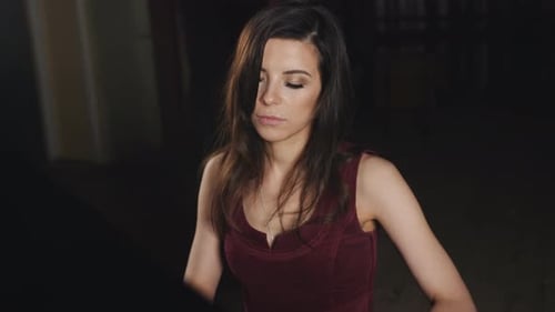 The Woman Playing the Piano in a Concert Hall Close Up of a Woman