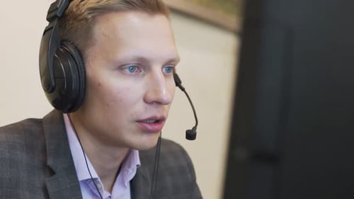 Friendly Handsome Young Male Call Centre Operator