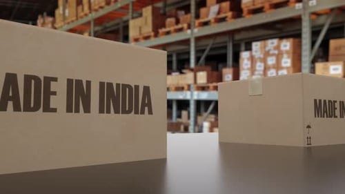 Boxes with MADE IN INDIA Text on Conveyor