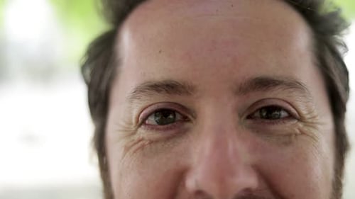 Extreme Close Up of a Man's Face Smiling