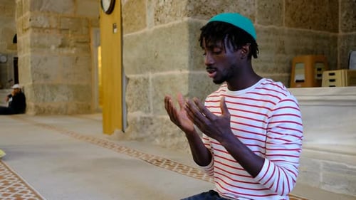 Man Praying in Mosque