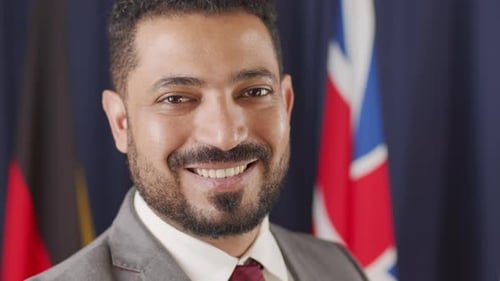 Close Up of Middle-Eastern Politician Smiling at Camera
