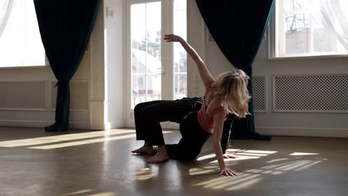 Couple is Dancing Contemporary Choreography Young Woman and Man are Rehearsing in Hall