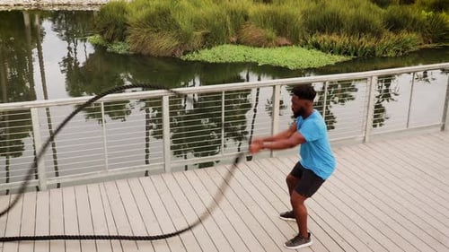 Aerial shot of a man working out in the park