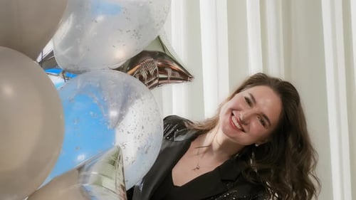 Close-up Shoot Birthday Surprise for a Girl in a Black Dress