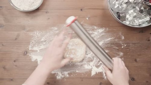 Cookie Dough Rolled on Wood Table for Christmas Baking