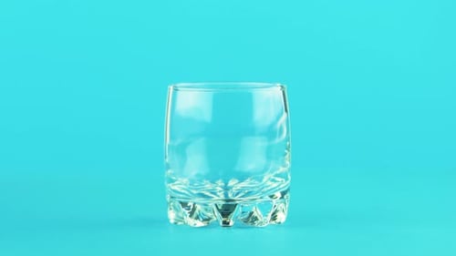 Orange Juice Being Poured Into a Glass