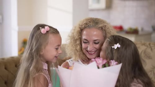 Grandmother Receives Flowers from Granddaughters