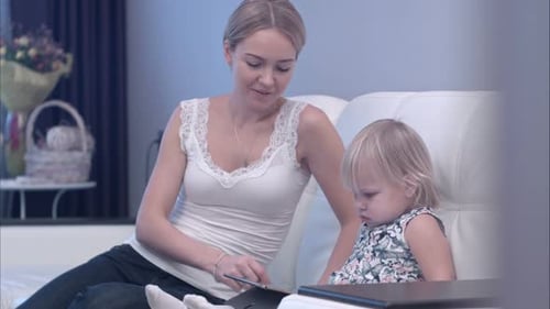 Mother and Child Using a Tablet Together