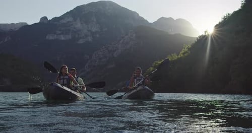 Kayaking on Lake Amidst Stunning Mountain Landscape