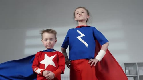 Children Dressed Up as Superheroes Indoors