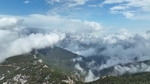 Cloudy landscape high in the mountains aerial view 4 K