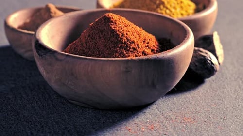 Wooden Bowls Filled with Colorful Aromatic Spices