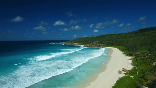 Deserted Sandy Beach With Waves on Tropical Island