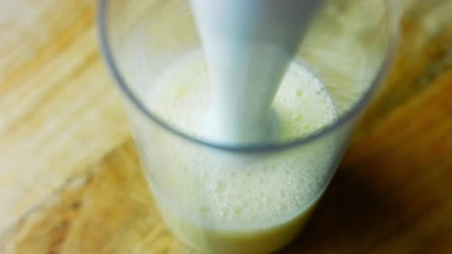 Blending Yellow Liquid with an Immersion Blender