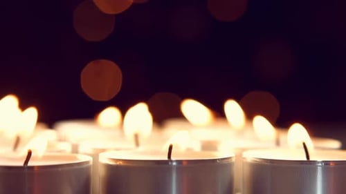 View of candles burning