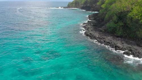 Aerial Shot of a Fantastic Blue Lagoon Beach on the Bali Island with a Crystal Clear Blue Water and