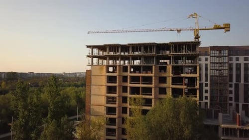 Aerial view of tall residential apartment buildings under construction